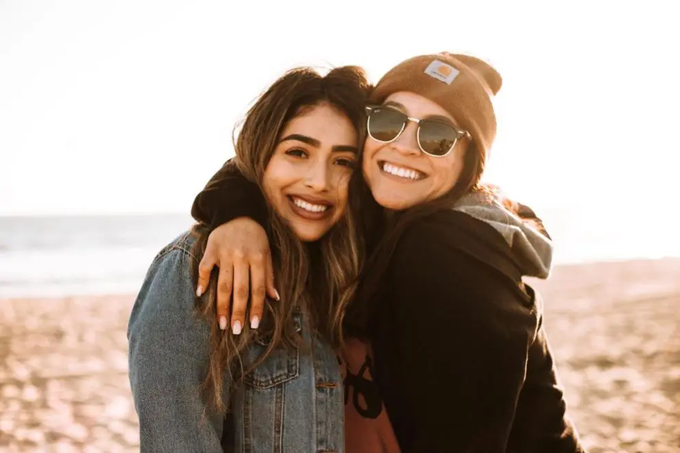 Two people smiling and embracing, representing Orthodontic Insurance Plans at Natalie Yang Orthodontics in Vacaville, CA